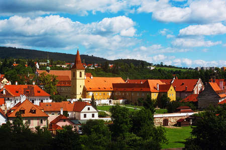 CESKY KRUMLOV, CZECH REPUBLIC - JULY 06, 2016: Monastery yard on the Vltava river bank with a bell towerのeditorial素材