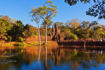 SIEM REAP, CAMBODIA - JANUARY 02, 2017: Angkor ancient city gate and bridge over the reservoir canalのeditorial素材