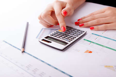 Keyboard on office desk used by a businesswoman.