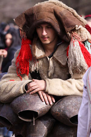 Bulgaria - jan 31, 2015: Man in traditional masquerade costume is seen at the the International Festival of the Masquerade Games "Surva" in Pernik, Bulgaria. Photo taken on: January 31th, 2015のeditorial素材