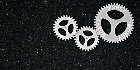 several gears with different inscription. topic of finance. Money, sales, marketing.の写真素材