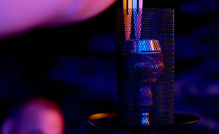 Hookah tongs changes charcoal on hookah bowlの写真素材