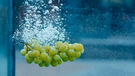 grapes thrown into the water so there were bubbles