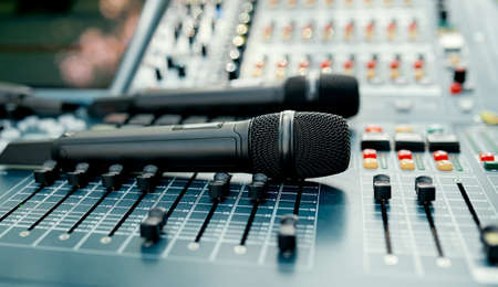 Microphones are on the sound console on the street before a live performance. High quality photoの写真素材