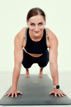 Woman in Plank Position on flor