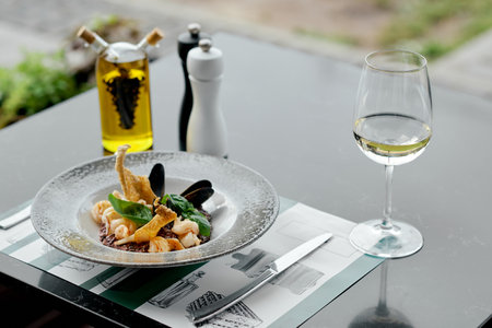 Gourmet Seafood Platter with Basil and Wine.