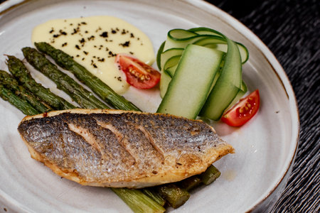 Close-Up of Grilled Sea Bass with Asparagus.