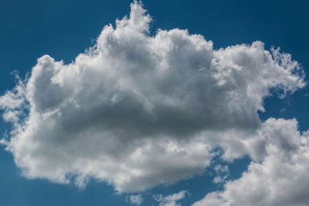 Summer landscape. In horizontal position. White clouds against a blue sky. Photographed at a wide...