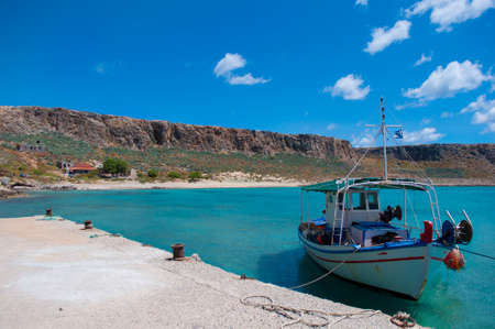 The boat at small port Gramvousa island Greeceの写真素材