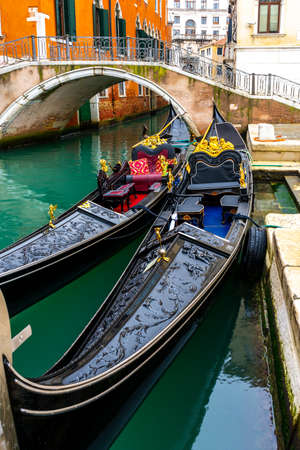 Gondolas on the Grand Canal in Venice, Italy. Venice is a popular tourist destination of Europe.の写真素材