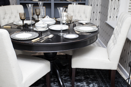 Served table in dining roomの写真素材
