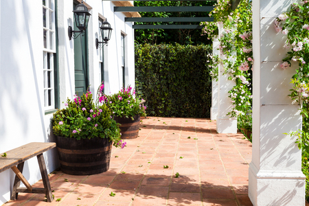 Garden landscape with flowerbed and entrance areaの写真素材