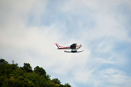 airplane over the Como lake