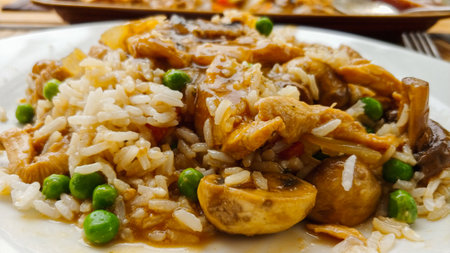 Risotto with mushrooms and green peas. Close-up.の写真素材