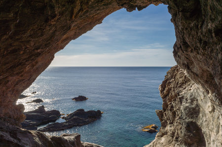 Rocky coast of the island of Malta. View from the cave.の写真素材