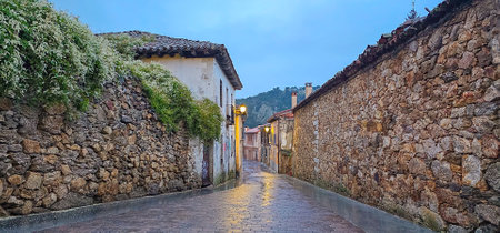 Panoramic view of a narrow street in the old town of Girona, Catalonia, Spain
