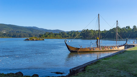 Traditional wooden fishing boats on the coast of the Amazon river in Peru