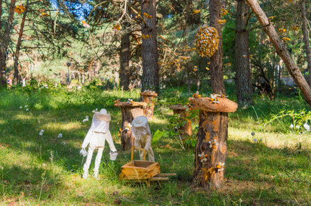 Wooden figures of angels in the forest. Christmas and New Year decoration
