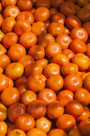 Tangerine background at street marketの写真素材