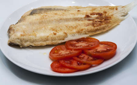 Image of tomato and flounder ready for eatの写真素材