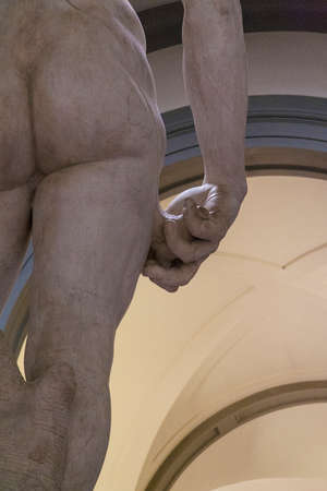 A rear view of the statue of David's rear end cast in marble.の写真素材