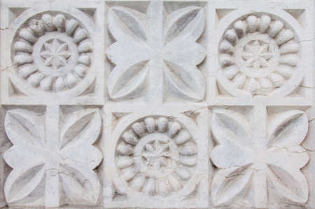 Antique stonework in ancient buildingの写真素材