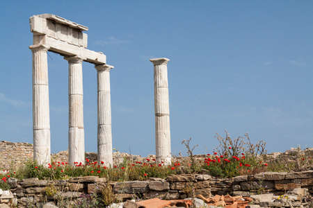 ancient columns in the archeologic site of Delos, near Mykonos in Greece.の写真素材