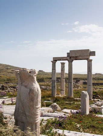 ancient columns in the archeologic site of Delos, near Mykonos in Greece.の写真素材