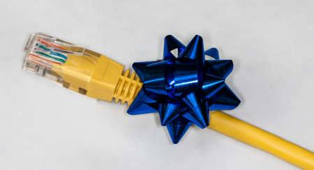 Ethernet plug with ribbon isolated on whiteの写真素材