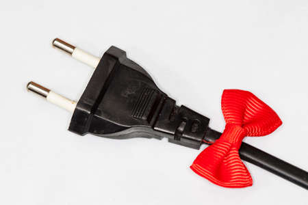 Electric Plug with ribbon isolated on whiteの写真素材