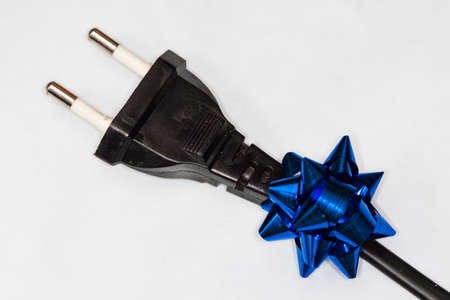 Electric Plug with ribbon isolated on whiteの写真素材