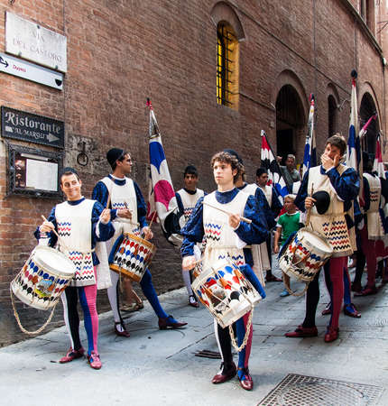 Siena, ITALY   Winners of the race parade the streets 