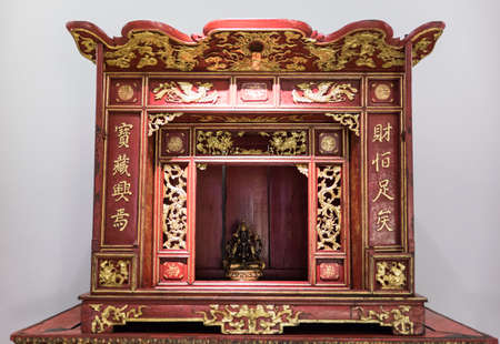 Buddha at a small home altarの写真素材