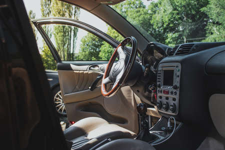 Interior of an Alfa Romeo 147, clean and polished shining exhibited on a bright sunny dayのeditorial素材