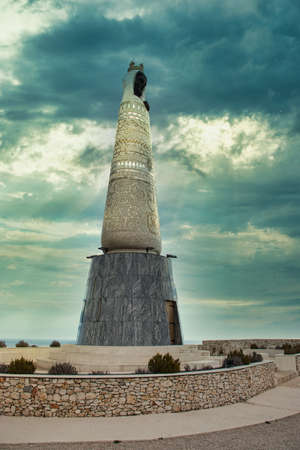 Primosten Croatia, July 2020 Statue of holy mother Mary on a hill, near the town of Primosten in Croatia. Dark cloudy dayのeditorial素材