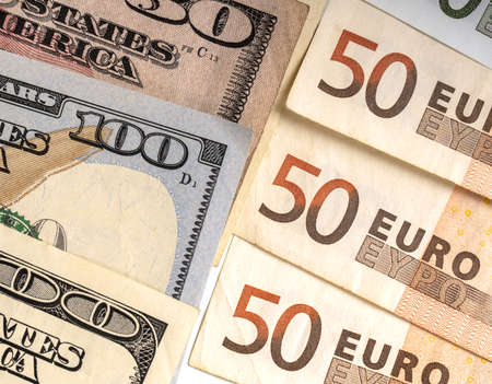 dollar and euro bills, top view, close-up