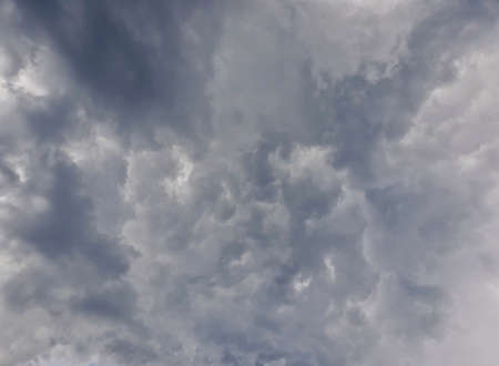Sky with dark clouds, full screen image.