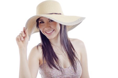 Portrait of a cute young woman wearing a hat and smilingの写真素材