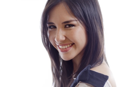 Headshot of a young beautiful woman smilingの写真素材