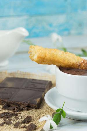 Typical Spanish breakfast, fritter and chocolateの写真素材