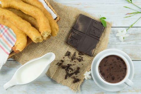 Typical Spanish breakfast, fritter and chocolateの写真素材
