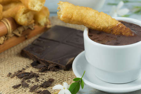 Typical Spanish breakfast, fritter and chocolateの写真素材