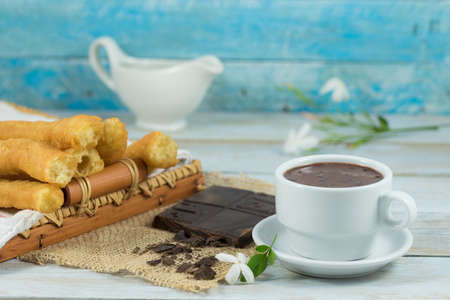 Typical Spanish breakfast, fritter and chocolateの写真素材
