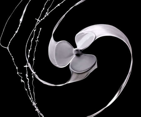 Abstracted photo of white fan blades isolated on blackの写真素材