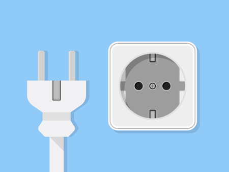 Power plug and socket. Vector illustration in flat design. Isolated on blue background.のイラスト素材