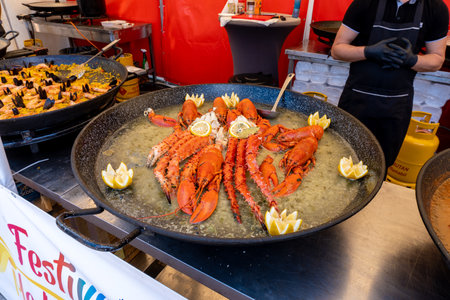 Lobster in a pan on display at a seafood market.のeditorial素材