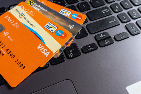 Credit cards on a laptop keyboard close-up. Online shopping conceptのeditorial素材