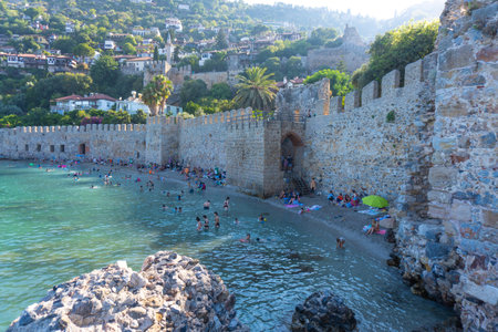 Awesome view of the beach by the coast of Alanya, Turkey. Amazing coastline. The ancient shipyard is a popular tourist attraction in Turkey.のeditorial素材