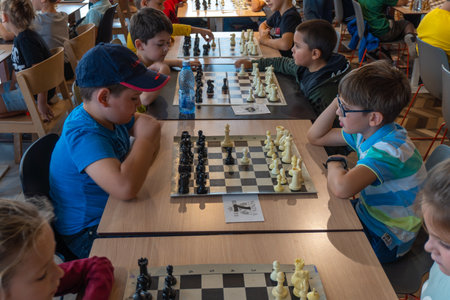 Children play chess in the open air.のeditorial素材