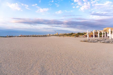 Black Sea Modern Beach on a sunny day with a blue sky,Constanta beach at Black Sea,panoramic view...